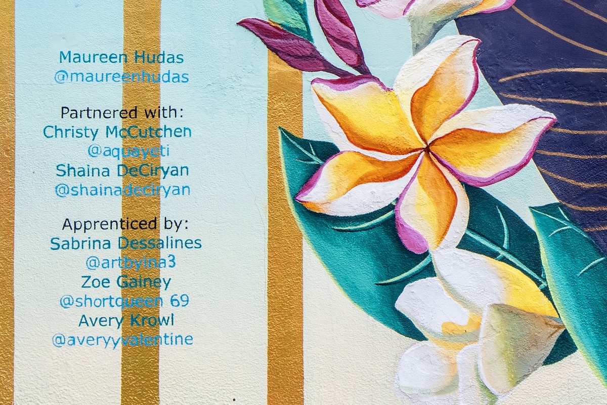 names painted on wall with plumeria